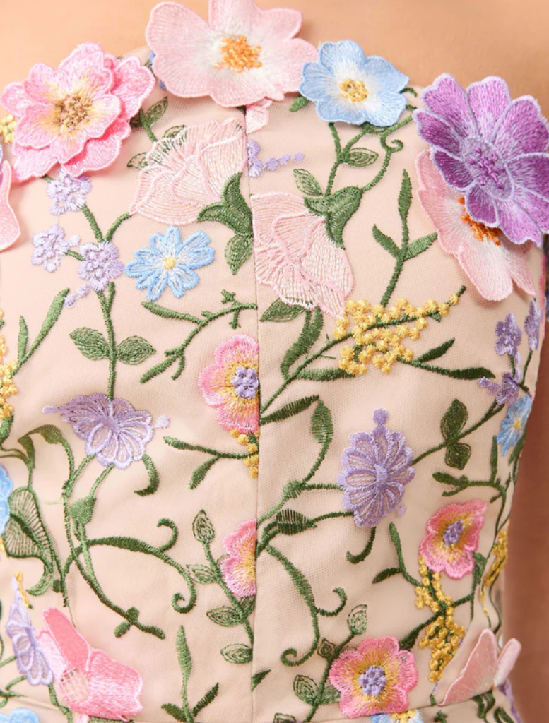 Strapless floral gown made from vibrant floral print fabric, showcasing a stylish and elegant design.