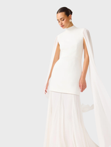 White gown featuring stylish cape sleeves, perfect for evening events and formal gatherings.