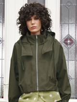 Khaki off-duty jacket displayed on a hanger, featuring a casual design suitable for relaxed outings.