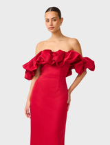 Red off-shoulder column gown by Lucetta, featuring a sleek silhouette and elegant design.