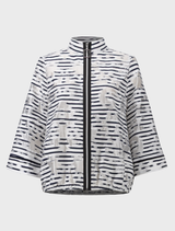 Off-white and navy jacket presented on a hanger, illustrating a chic and fashionable option for various outfits.