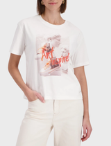 Casual outfit showcasing an Off-White T-shirt and trendy sneakers, emphasizing modern streetwear style.