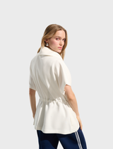 Stylish off-white hip-length jacket, ideal for sporty looks and versatile enough for various occasions.