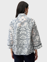 Modern off-white and navy jacket showcased, emphasizing its versatile style for everyday and outdoor activities.