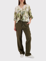 Olive tropical blouse featuring a round neckline and ¾ sleeves, made of 100% viscose, ideal for summer wear.