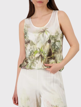 Olive satin top with tropical print, round neckline, tank sleeves, and elastic hem, ideal for a chic summer outfit.