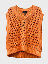 Elegant openwork cardigan in a warm aperitif hue, showcasing a breathable design ideal for transitional weather.
