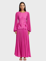 A flowing maxi dress in a vibrant topaz color, featuring a sleeveless design and a flattering silhouette.