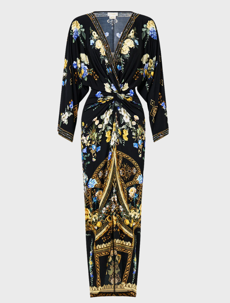 Long split front twist dress in Ottoman style, featuring elegant draping and a sophisticated silhouette.