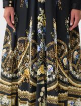 Elegant dress with a shaped waistband and gathered sleeves, showcasing Ottoman-inspired design and style.