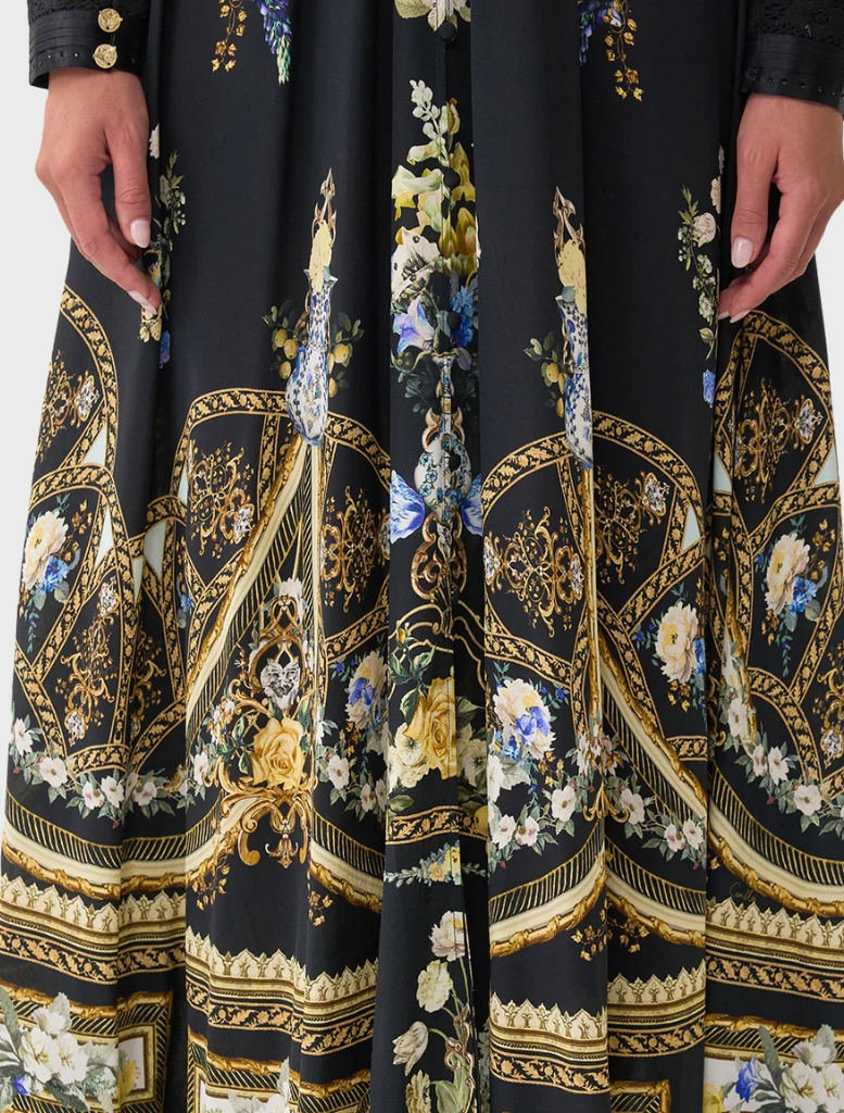 Elegant dress with a shaped waistband and gathered sleeves, showcasing Ottoman-inspired design and style.