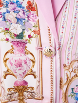 Pink blazer with floral designs, featuring a relaxed fit labeled as Relaxed Suit Jacket - Palapast.
