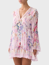 Lightweight pink floral Tiered Swing Mini Dress by Palapast, designed for comfort and a stylish summer look.