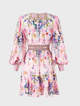 Close-up of a floral print skirt featuring a belt, showcasing the Button Front Frill Dress by Palapast.
