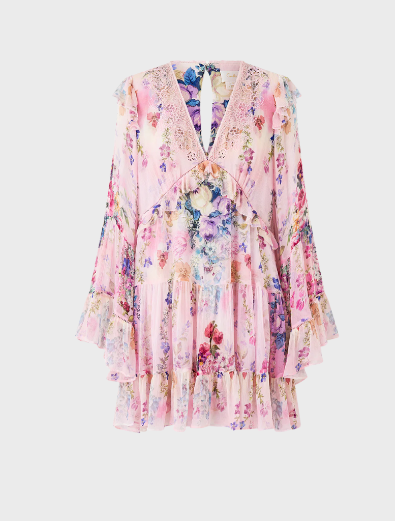 Pink floral Tiered Swing Mini Dress by Palapast, crafted from soft lightweight fabric for comfort and style.
