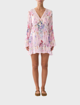 Pink tiered swing mini dress with a floral print, designed by Palapast.