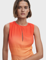 A dress featuring a vibrant orange and blue print, showcasing a stylish and colorful design.