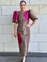 Stylish leopard floral dress with puff sleeves, fitted shape, and back hem split for enhanced movement and sophistication.
