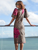 Stylish leopard floral dress with puff sleeves, fitted design, and a back hem split for enhanced mobility.