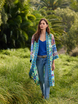 Colorful patchwork kimono featuring various fabric patterns and textures, designed by Armeria.