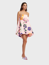 Elegant mini dress by Wildbloom, adorned with puff sleeves and intricate embellishments in a lively floral print.