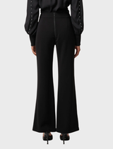 Black viscose stretch pants by Marcela Pearl, featuring elegant embellishments for a stylish look.