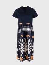 Chic black and white dress with a patterned design, suitable for both casual and formal wear.