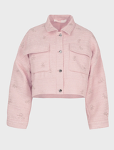 Elegant pink Tweedle Bow Jacket adorned with a bow, perfect for enhancing your outfit with a touch of charm.