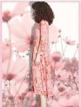  Elegant pink floral dress showcasing a fitted design, short sleeves, and a knee-length cut, ideal for warm weather.
