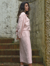 Chic pink tweed skirt designed with a sophisticated look, ideal for enhancing any wardrobe with a touch of elegance.