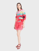 Urban-inspired pink bomber jacket with a lively jacquard pattern, made from breathable cotton, perfect for summer wear.

