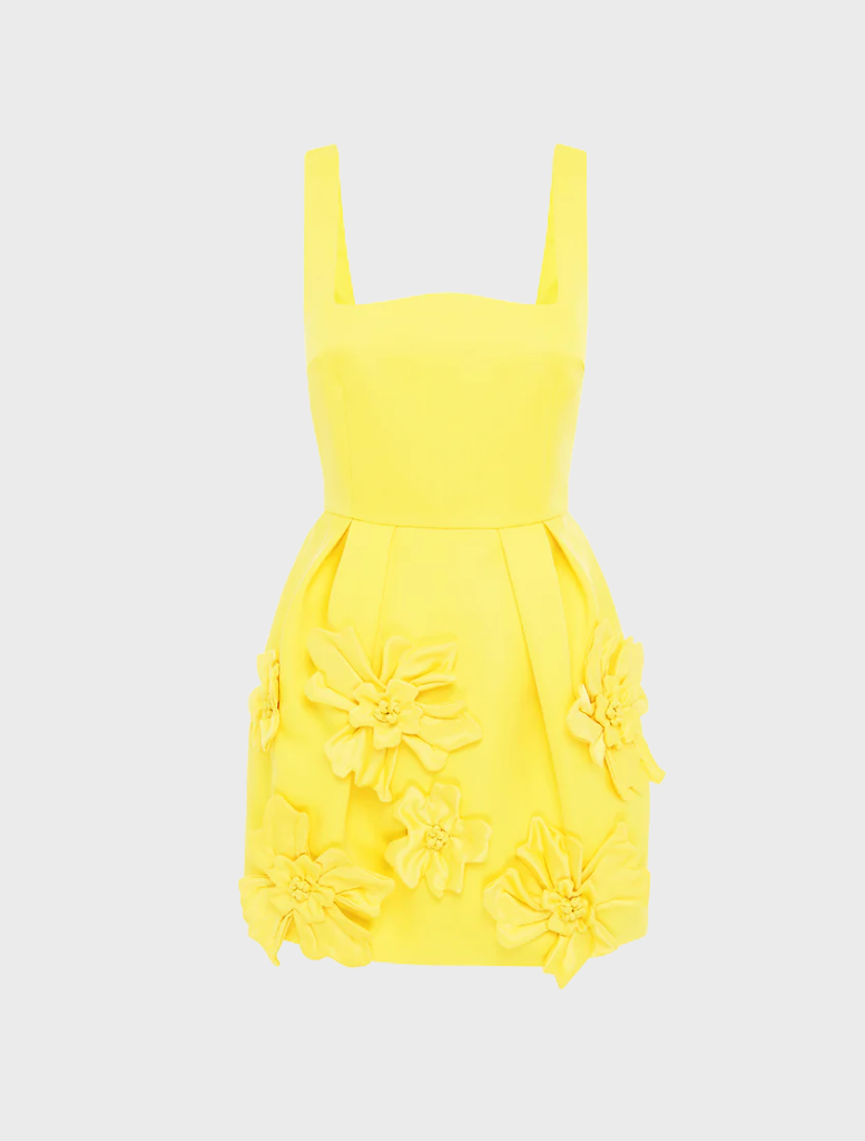A yellow dress with a floral design, capturing a bright and cheerful aesthetic.
