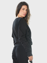 Stylish black sweatshirt with "Pirouette & Forget" text, designed for comfort and dance-inspired fashion.