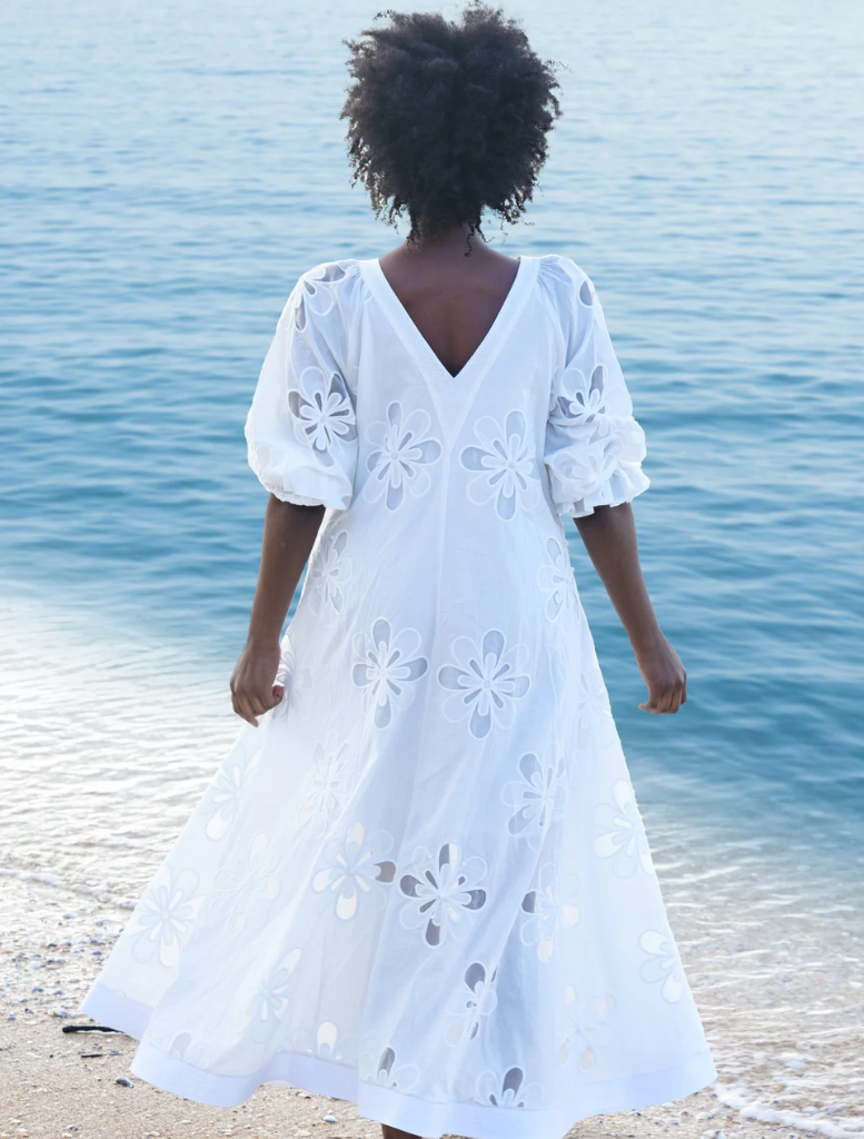 White Girl Boss Blazer laid flat, highlighting its sharp lapels and tailored cut, ideal for business or formal occasions.