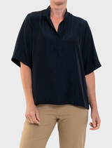 Navy Placket Plaza Top featuring a classic design, suitable for casual or semi-formal occasions.