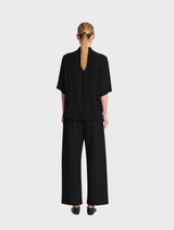 Elegant black Placket Plaza, designed with a minimalist approach, perfect for stylish outdoor spaces.