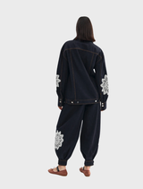 Modern Bowie jacket in indigo denim, highlighted by a lace plaid pattern, ideal for a fashionable wardrobe.