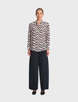 Elegant soft shirt with pleats, designed for comfort and style, perfect for both casual and formal wear.