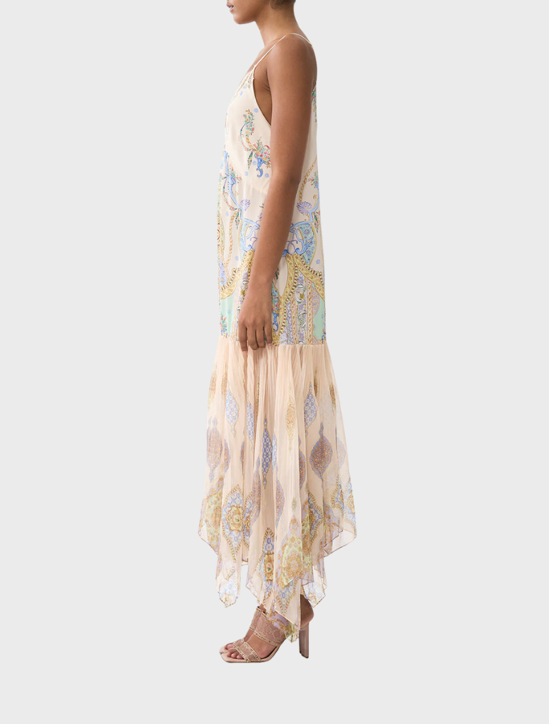 East Of Istanbul's minimal slip dress with a pleated chiffon skirt, combining simplicity and elegance in design.