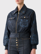  Elegant denim bomber jacket with pockets, ribbed cuffs, and crystal embellishments, offering a polished yet casual style.