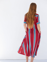 Red Polet dress with a flattering cut, designed for sophistication at events or casual gatherings.