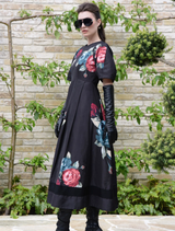 Black floral dress featuring a weasel design, perfect for casual or semi-formal occasions.