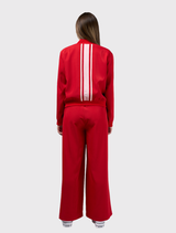 Poppy and blush bomber jacket with ribbed hem, cuffs, collar, zip front, and contrasting tape detail on back and pockets.