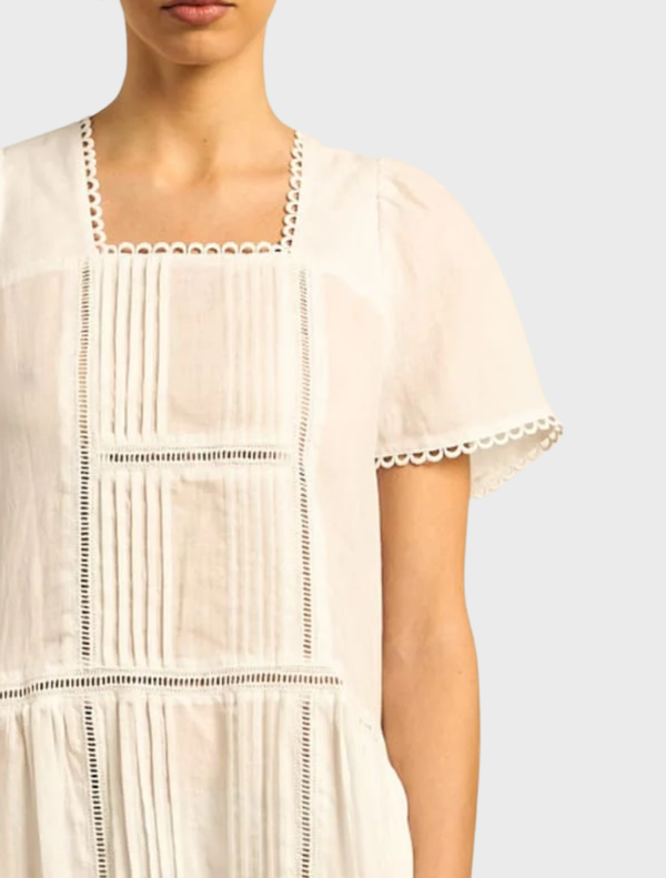 Elegant Porcelain Skyscape Dress with a soft, flowing design, perfect for formal events or casual outings.
