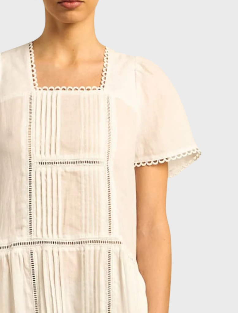Elegant Porcelain Skyscape Dress with a soft, flowing design, perfect for formal events or casual outings.
