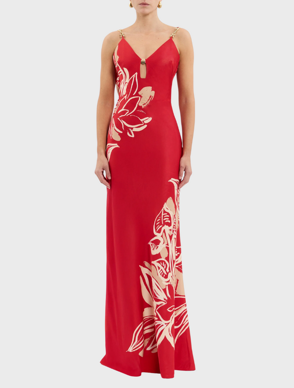 A striking red dress featuring elegant gold and red floral designs.