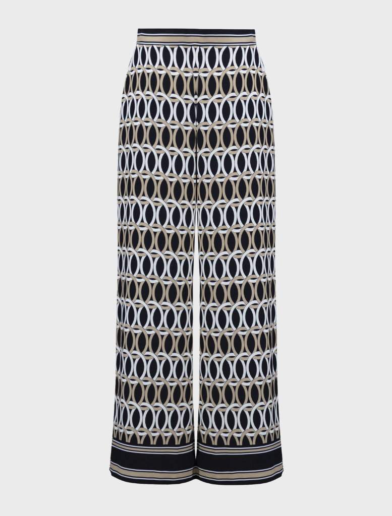 Fashionable midnight blue pants with a unique multi-colored print, suitable for both casual and dressy events.