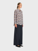 Comfortable soft shirt with stylish pleats, versatile for both casual outings and formal events.