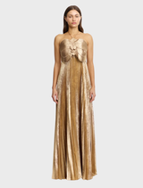 A gold Pullford maxi dress displayed on a mannequin, featuring a flowing silhouette and elegant design.