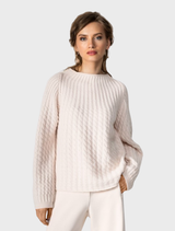 Blush pullover sweater with a chunky knit design, perfect for cozy layering in cooler weather.